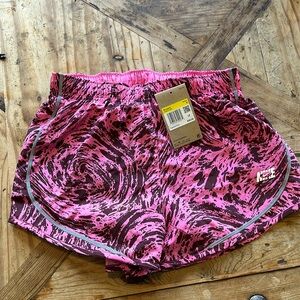Ladies pink swirl Nike running shorts size small new with tags